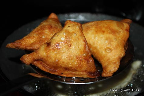 frying chicken samosa