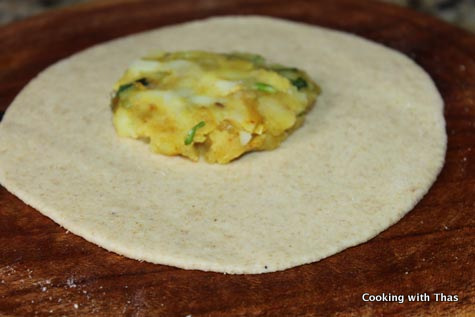 stuffing dough with potato