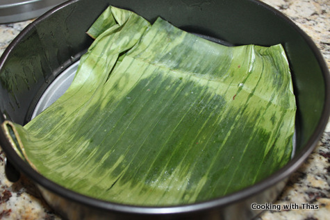 pan lined with banana leaf