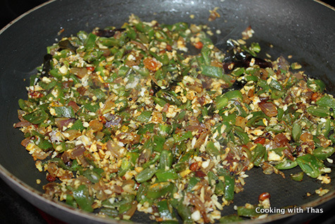 stir frying beans and coconut