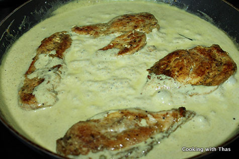 cooking chicken in coconut tamarind sauce