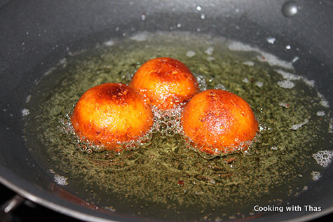 frying gulab jamun