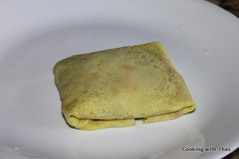 wrapping chicken crepe with chicken filling