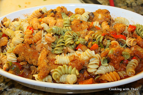 crusted chicken mixed with sauce and pasta