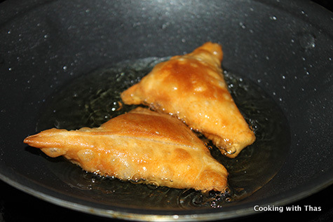 frying irani samosas