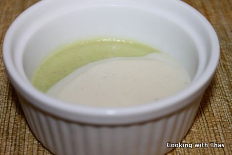 Pouring Apple=almond pudding over avocado pudding