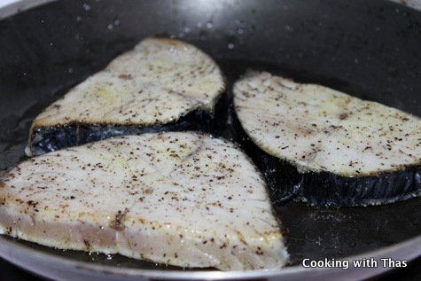 Shallow frying kingfish steaks