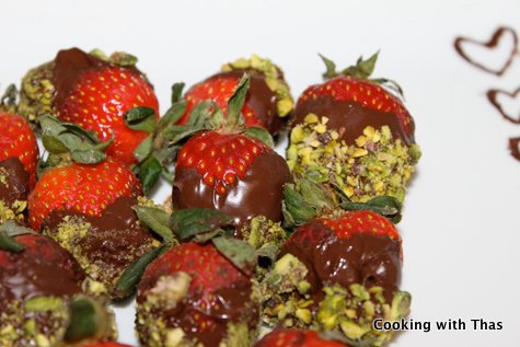Chocolate pistachios covered Strawberry