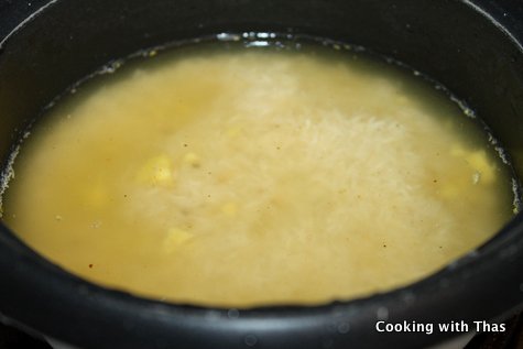 making rice for biryani