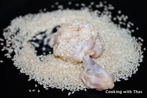 chicken lollipop with white sesame seeds