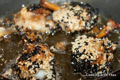 frying sesame chicken lollipop