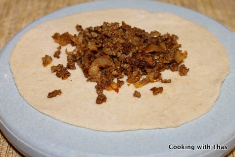 stuffing beef to paratha