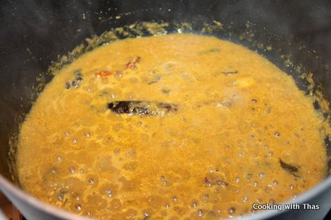 Making Chicken drummettes curry