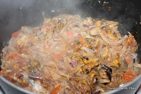 Making mussel biryani