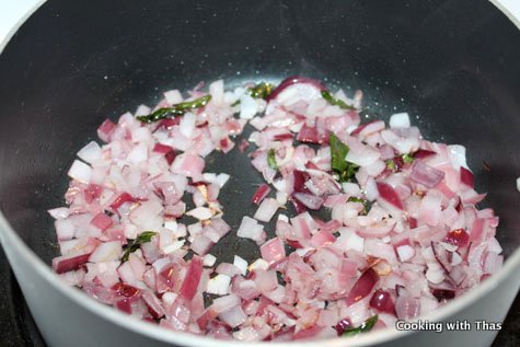making-poached-egg korma