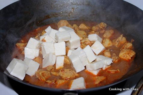 Cooking balti chicken-paneer and peas