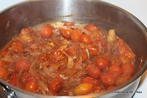 making cherry tomato pasta
