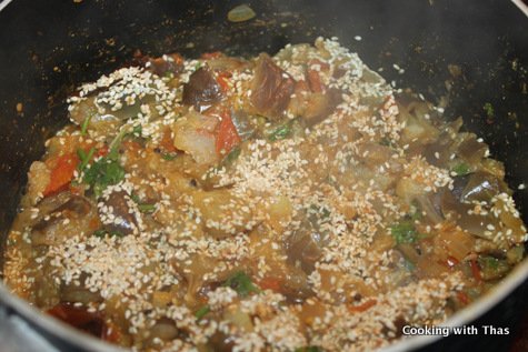making eggplant roast with sesame seeds