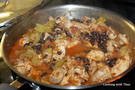 making chicken with beans and salsa