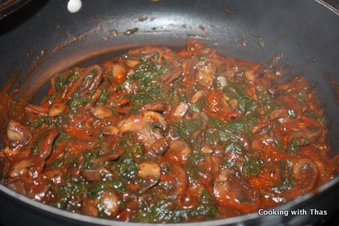 making mushroom-spinach sauce