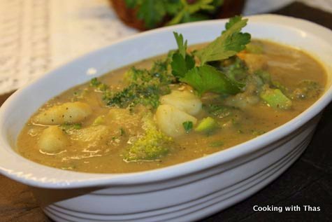 potato broccoli in onion sauce