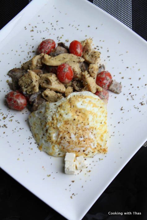 herb chicken with over easy egg