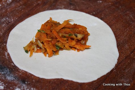 place veg filling on rolled dough
