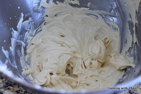 beating cream cheese