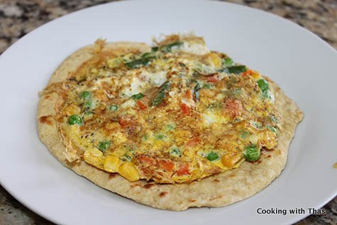 making chapati and egg rolls
