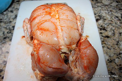 whole chicken stuffed with eggs