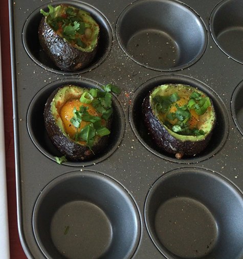 Making baked avocado egg